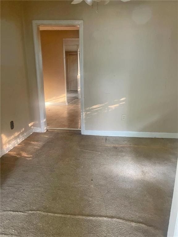 Unfurnished room featuring carpet