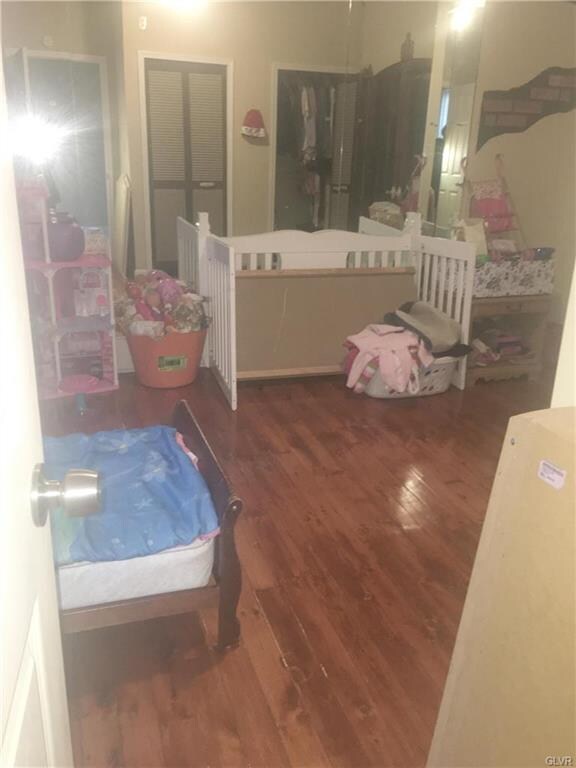 Pretty wood floors in front bedroom