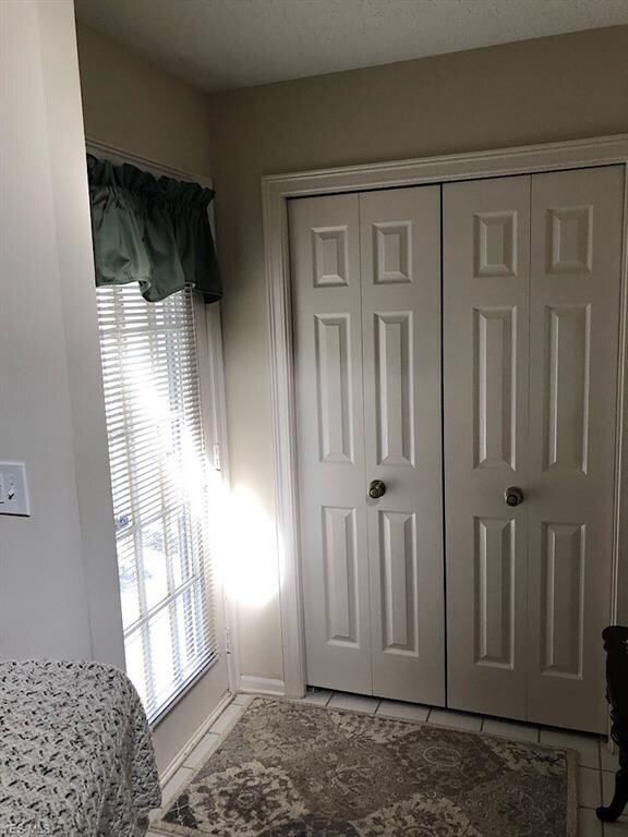 Foyer entry with large coat closet