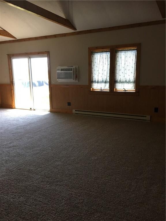 Family room. Sliders to backyard. In wall air cond