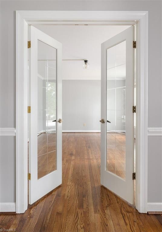 View to the Formal Living Room through the very attractive French Doors
