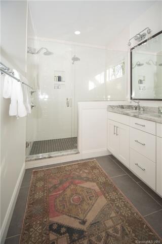 Double vanity master bath with custom walk in show