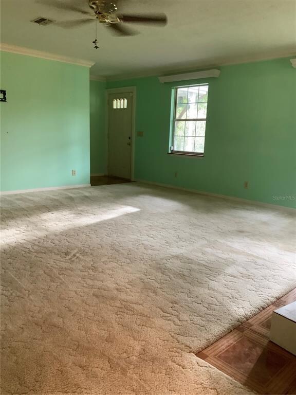 Looking across living room to the front door