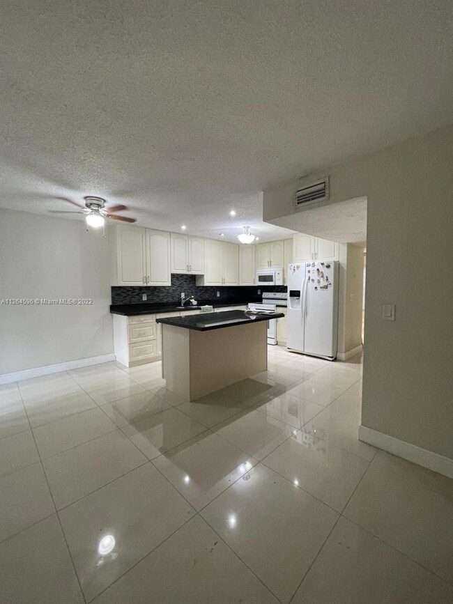 7595 NW 75th Ave, Tamarac, FL 33321 - photo 2