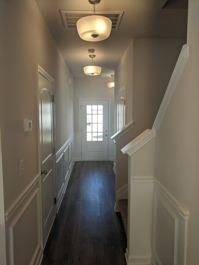 Immediately upon entry, you are greeted by your bright and welcoming foyer.