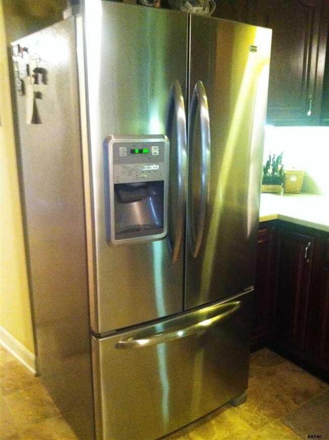 Stainless steel refrigerator along with other appl