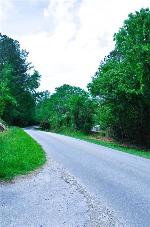 View of street with a wooded view