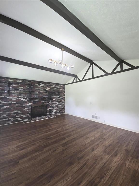 Unfurnished living room with wood finished floors, a fireplace, and baseboards