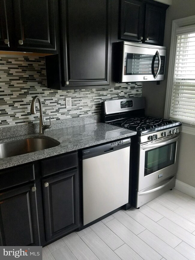 1040 Downton Rd, Halethorpe, MD 21227 - photo 2