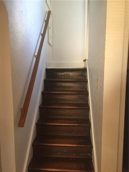 An additional stair case leading upstairs from the