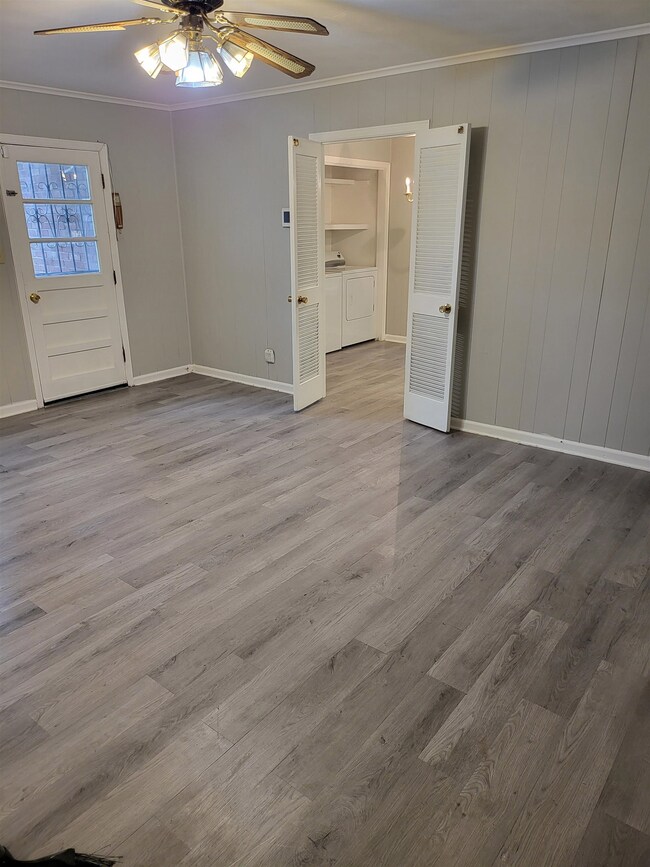 View to back door in Dens, ornamental molding, and