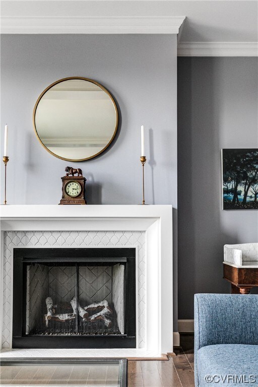 Room details with a tiled fireplace and ornamental