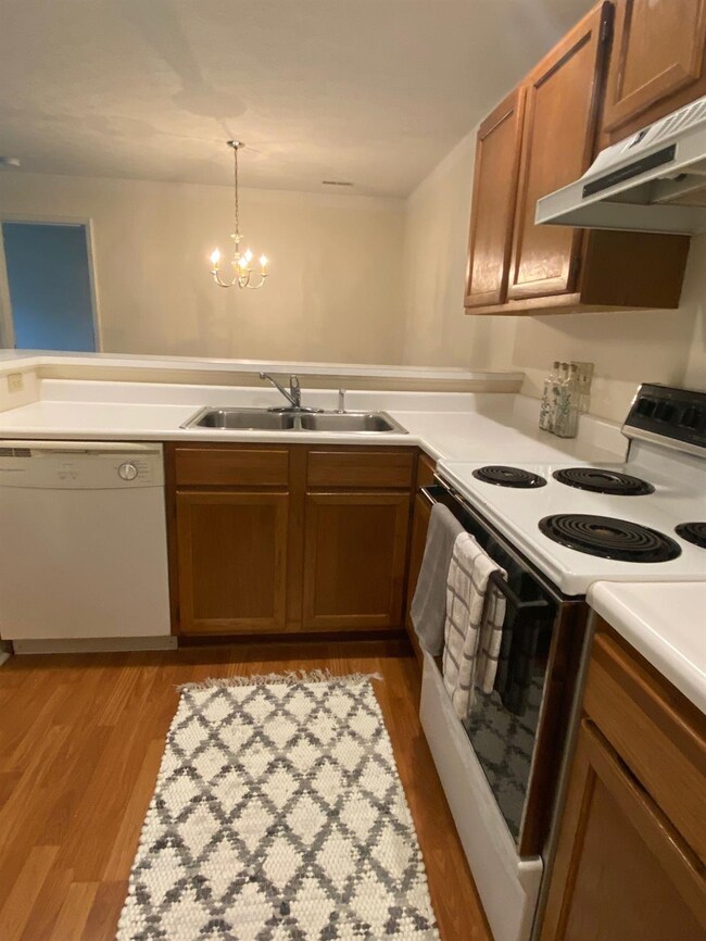 The kitchen is open to the living and dining areas.