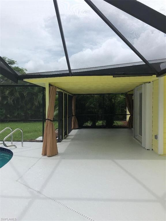 covered part of the lanai with the custom curtains