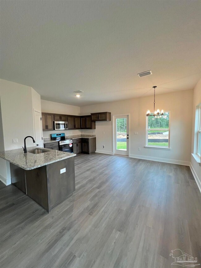 940 Rustling Pines Rd unit 13B, Cantonment, FL 32533 - photo 3