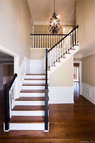 2 story Entry Foyer oak treads