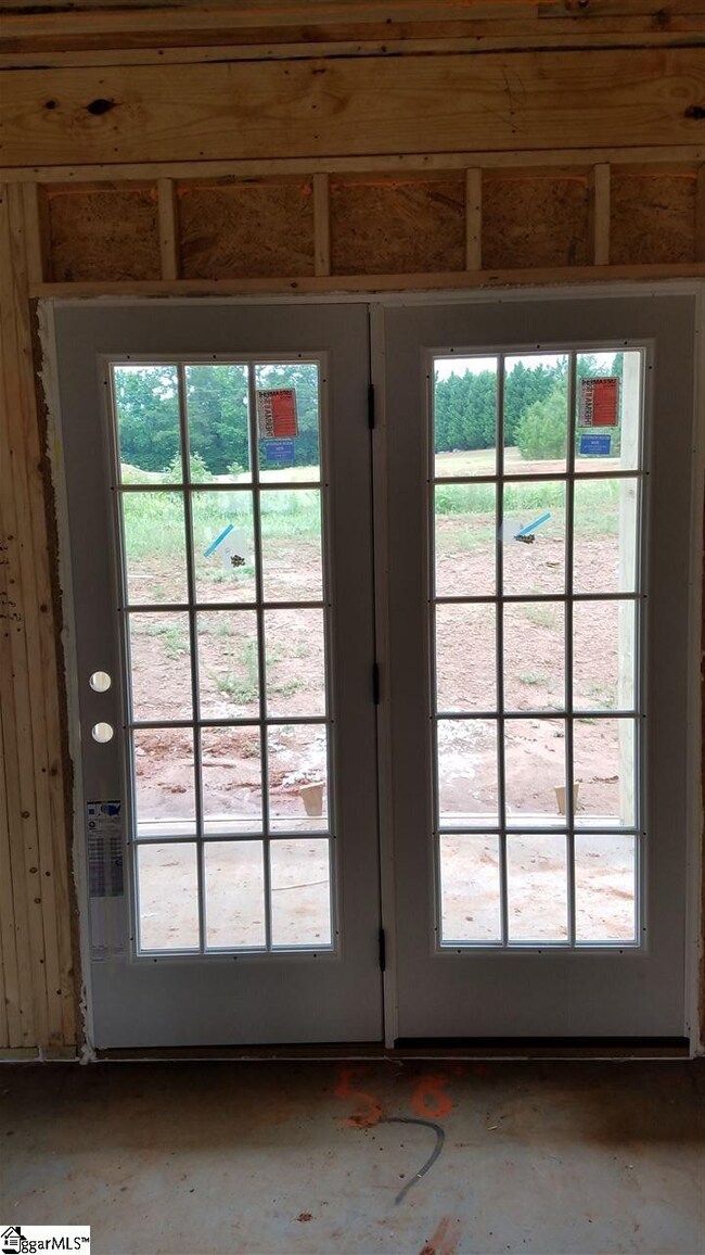 Garden doors leading to covered porch