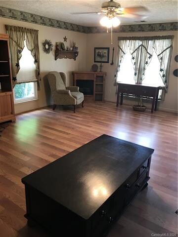 Large living room and new highly durable laminate hardwood floors.
