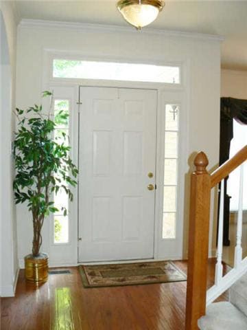 HARDWOOD FLOORS IN FOYER,DUAL STAIRCASES(IN FOYER AND KITCHEN)