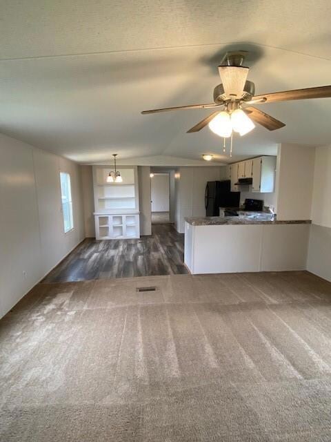 LIVING ROOM AND KITCHEN