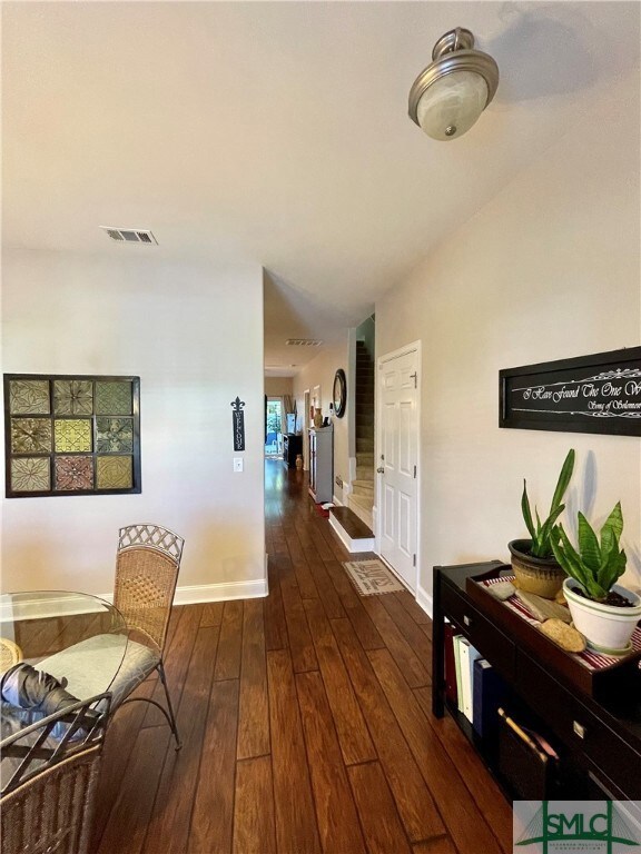 Front room has laminate wood flooring. Can be used