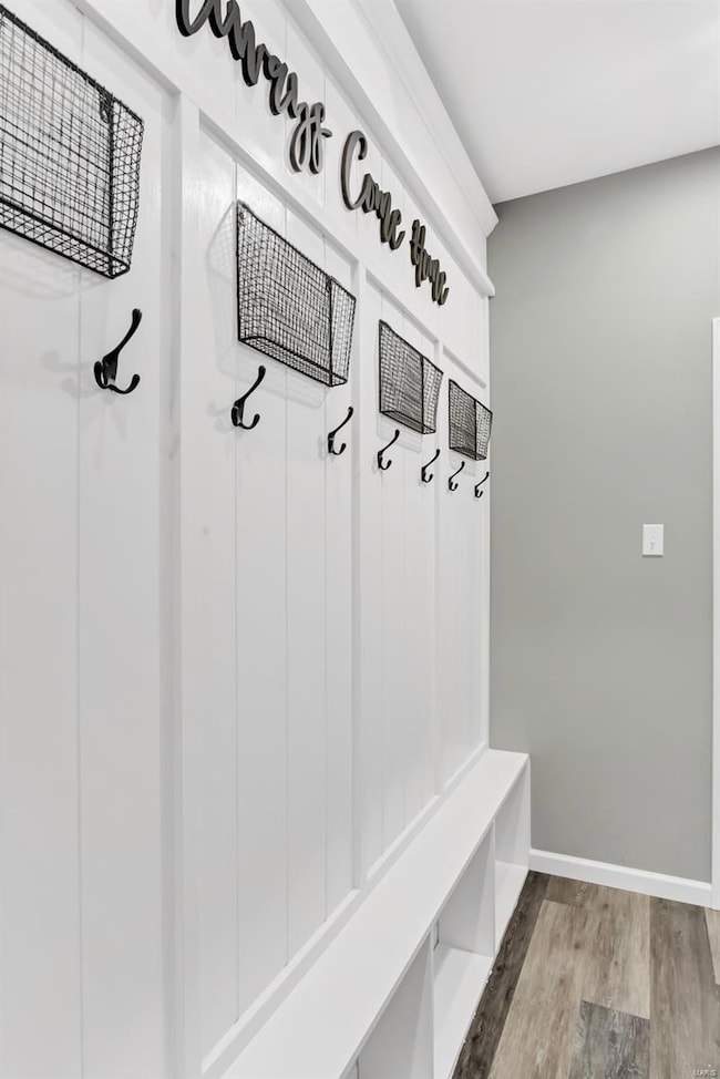 Farmhouse style entry off garage makes the perfect
