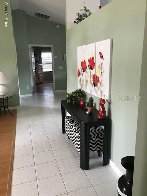 hall to living room to dining area