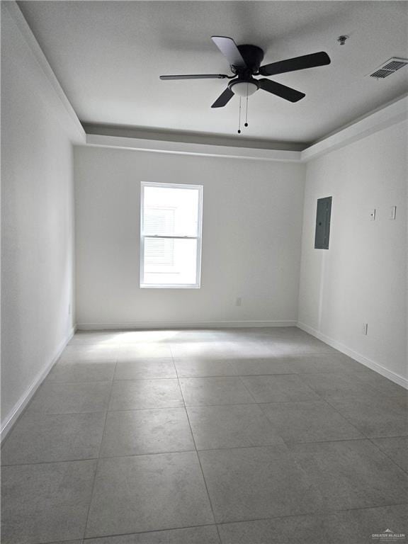 Empty room with electric panel, ceiling fan, and a pendent fire sprinkler