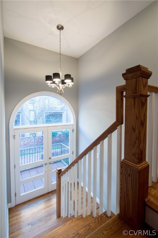 Bright entry with beautiful wood floors