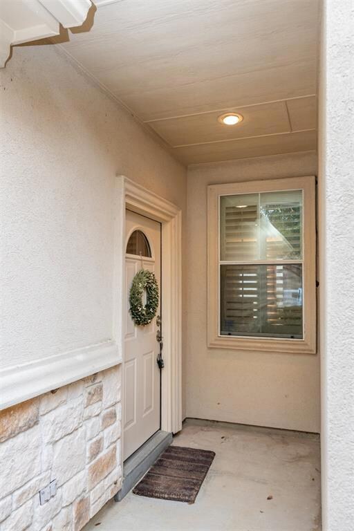 Private, covered entrance shields you from the ele