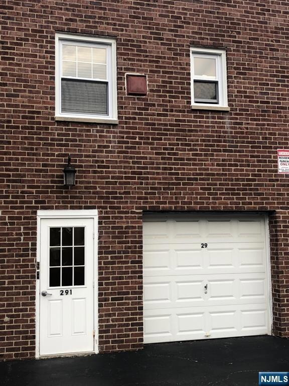 Rear Entrance from Private Parking Lot