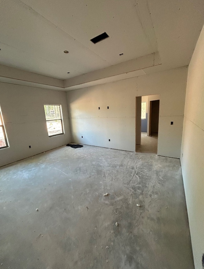 Spare room with concrete floors