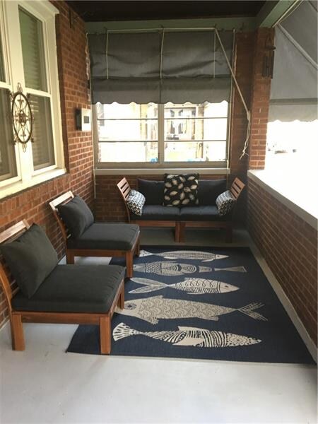 The cozy 20x08 covered front porch is the lace to 