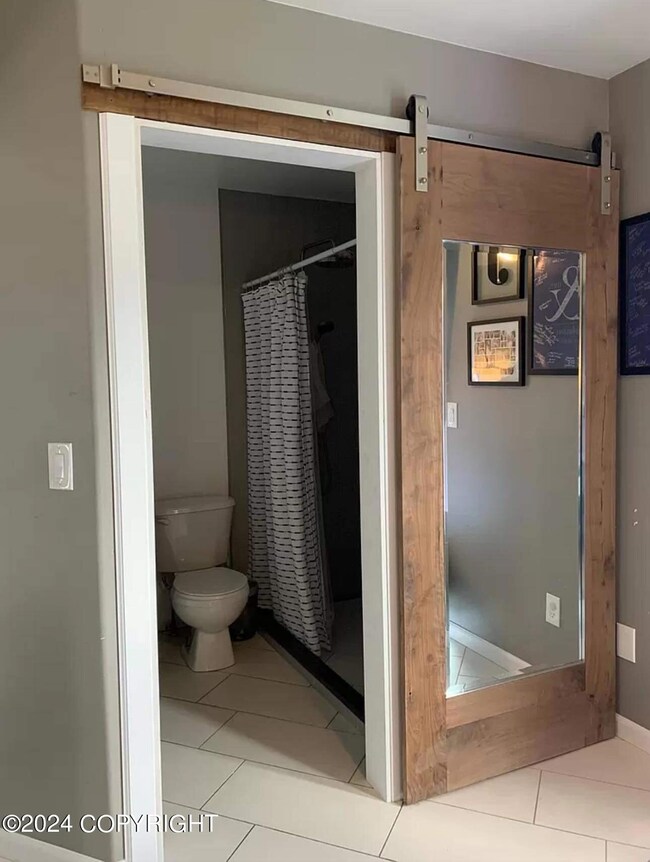 Has ensuite bath with step in shower