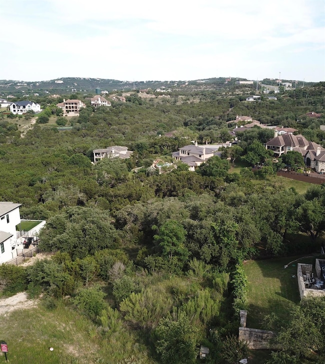 Aerial view of property and surrounding area with