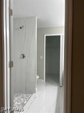 Full bath featuring a walk in shower