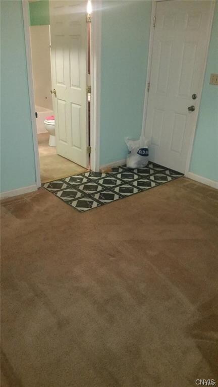 Family room opens to a full bath and a bedroom on 