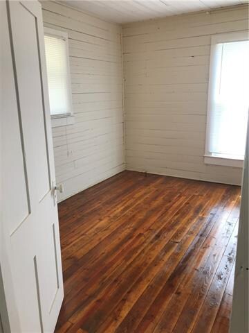 One of the three bed rooms down stairs, nice hardw