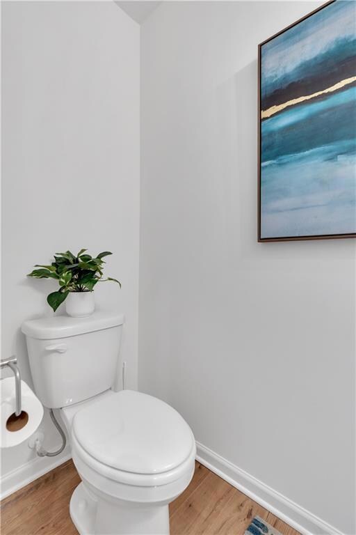 Bathroom with wood finished floors