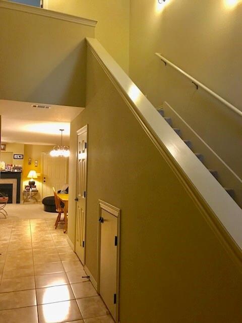 FRONT DOOR ENTRY OFFERS WIDE HALLWAY W/ CERAMIC TI