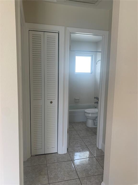 Hallway leading to guest bath