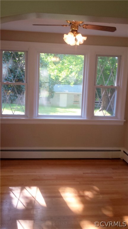 Dining room with Refinished Hardwoods