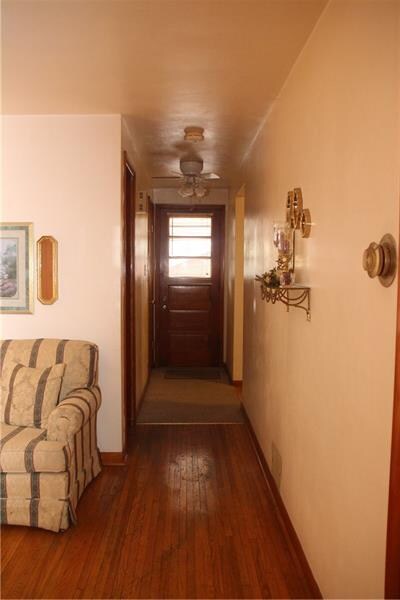 Hardwood floors in living room and hallway