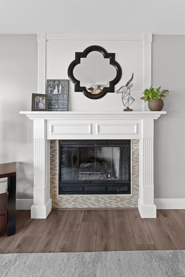 Gas Fireplace with Designer White Wood Detailing &