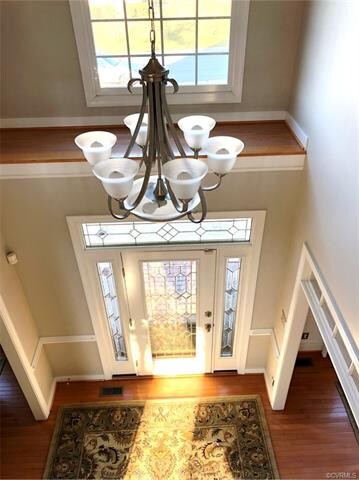 Dramatic light-filled tow story Foyer.