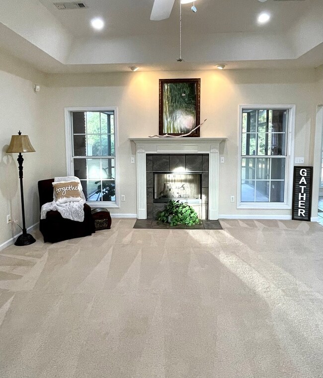 Trey Ceilings & Open Floor plan create a spacious