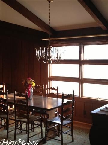 Open den, fp with indoor grill & vaulted ceiling