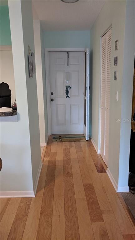 Entry Hall with Kitchen & pass-thru to left and ve