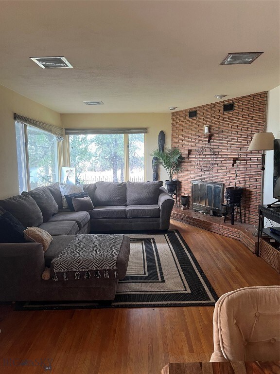 Nice sized living room with big windows for plenty