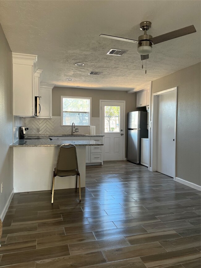 Living/dining/kitchen/laundry area